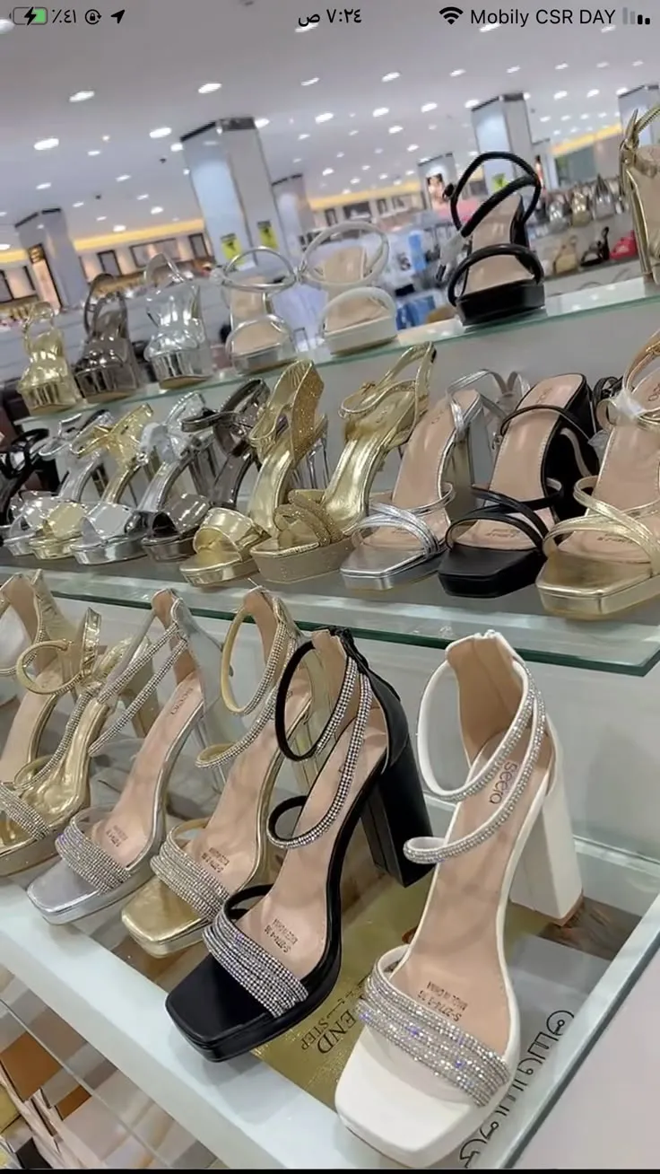 A person trying on heels or swatching lipstick in a boutique